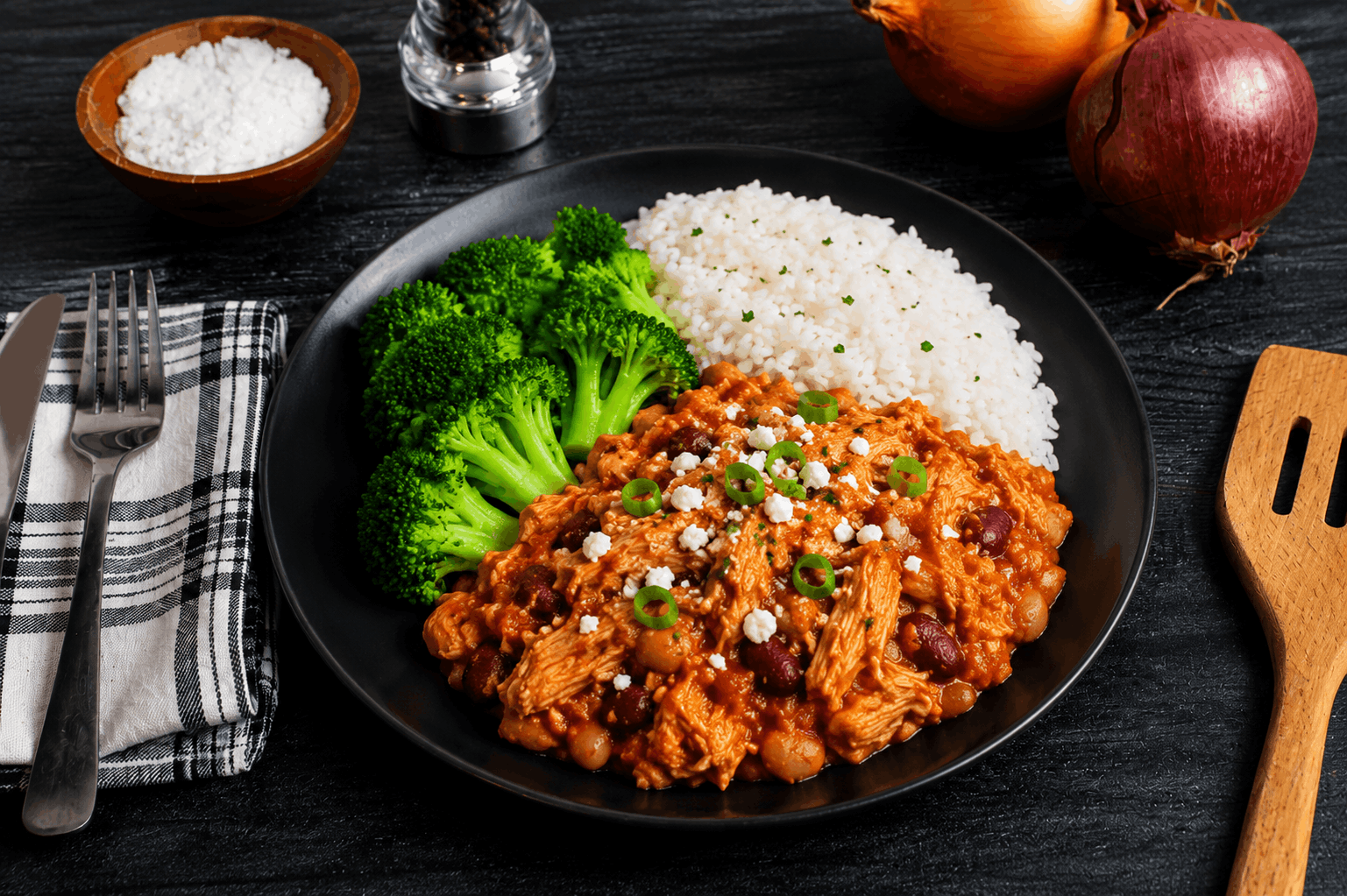 A hearty, flavor-packed Buffalo Chicken Chili made with hormone-free chicken, slow-simmered with carrots, celery, and a colorful blend of peppers. Loaded with tender beans and finished with a bold buffalo kick, it delivers the perfect balance of comfort and spice. Served alongside fragrant jasmine rice and crisp steamed broccoli for a wholesome, satisfying meal packed with protein and flavor.