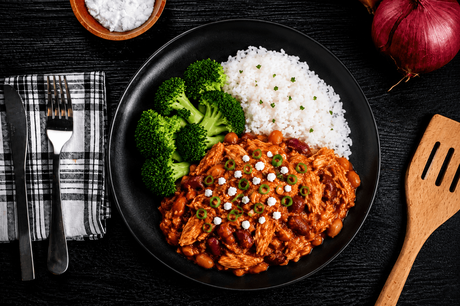 A hearty, flavor-packed Buffalo Chicken Chili made with hormone-free chicken, slow-simmered with carrots, celery, and a colorful blend of peppers. Loaded with tender beans and finished with a bold buffalo kick, it delivers the perfect balance of comfort and spice. Served alongside fragrant jasmine rice and crisp steamed broccoli for a wholesome, satisfying meal packed with protein and flavor.