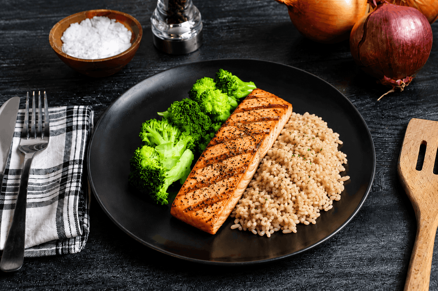 Fresh Atlantic salmon, oven-baked to perfection and lightly seasoned to let its natural flavor shine. Served alongside hearty brown rice and tender steamed broccoli for a clean, wholesome meal that's rich in protein, omega-3s, and simple goodness.