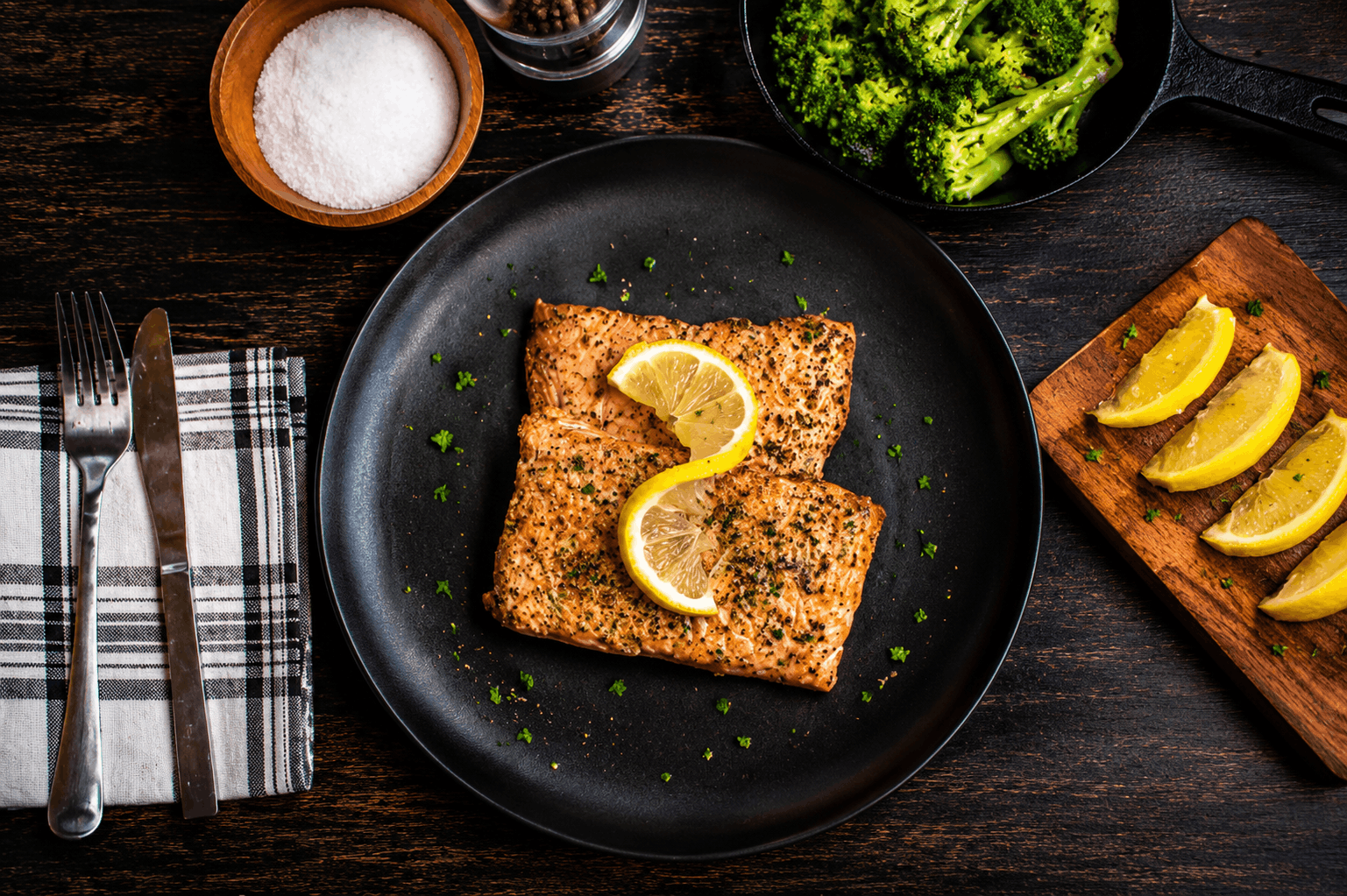 Enjoy 2 portions of fully cooked salmon with light seasoning.