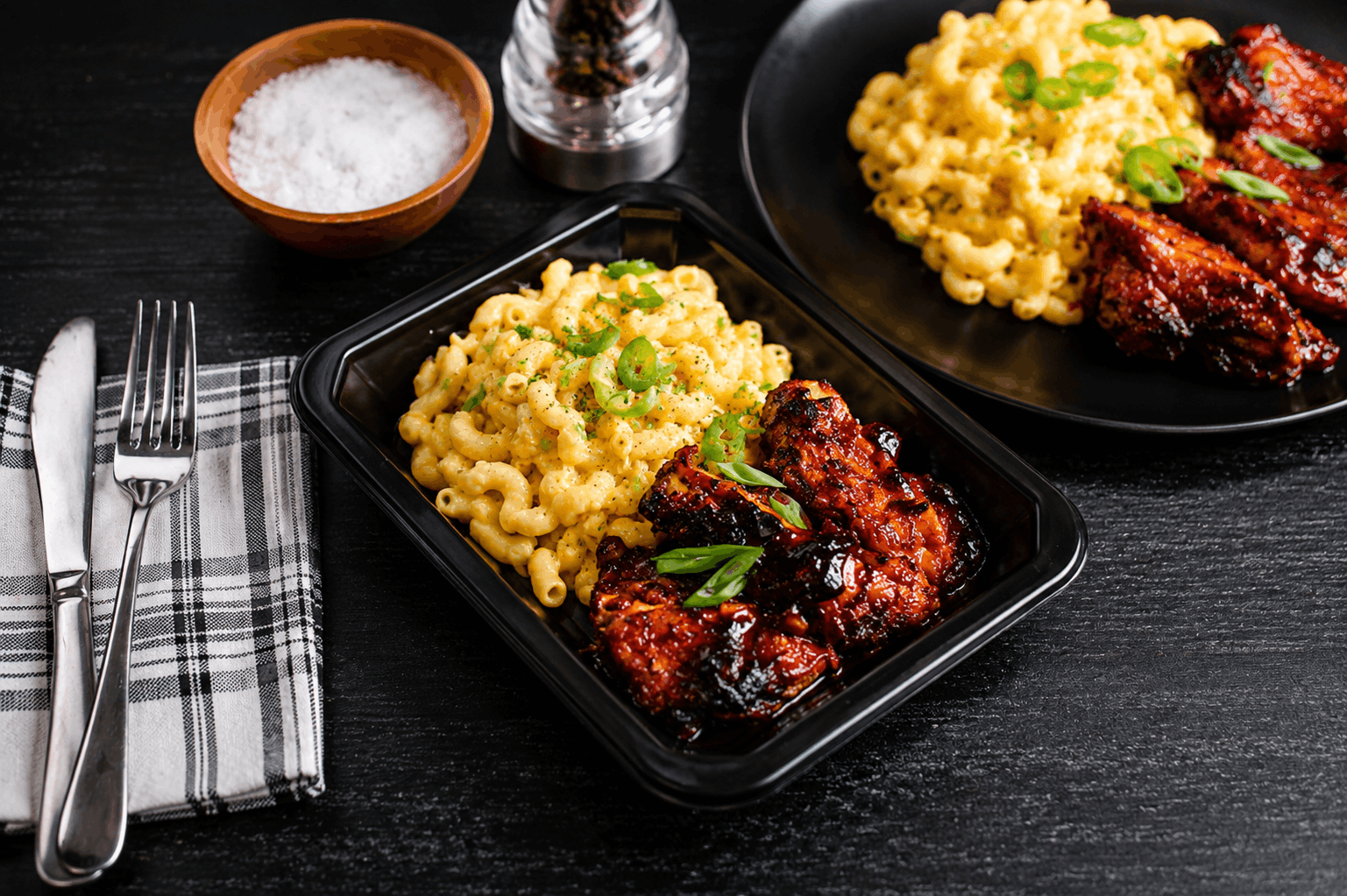 Tender boneless, skinless chicken thighs glazed in our house-made BBQ sauce and served alongside creamy three-cheese pasta. Finished with sliced jalapeños for the perfect balance of smoky, cheesy, and bold flavor.