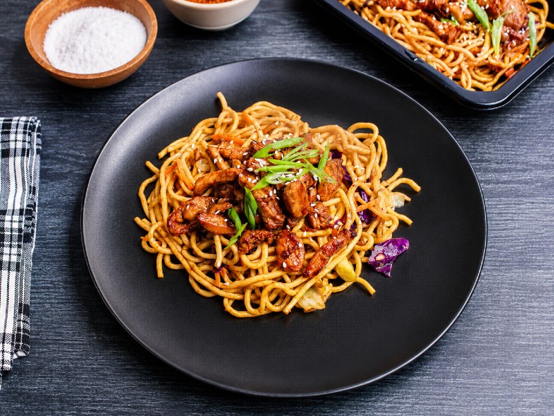 Tender chicken, crisp cabbage, and shredded carrots, lightly sautéed in our signature Asian sesame sauce and served over hearty whole wheat noodles.